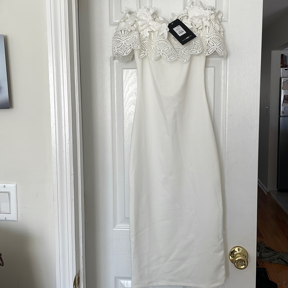 White dress size XS. Never worn